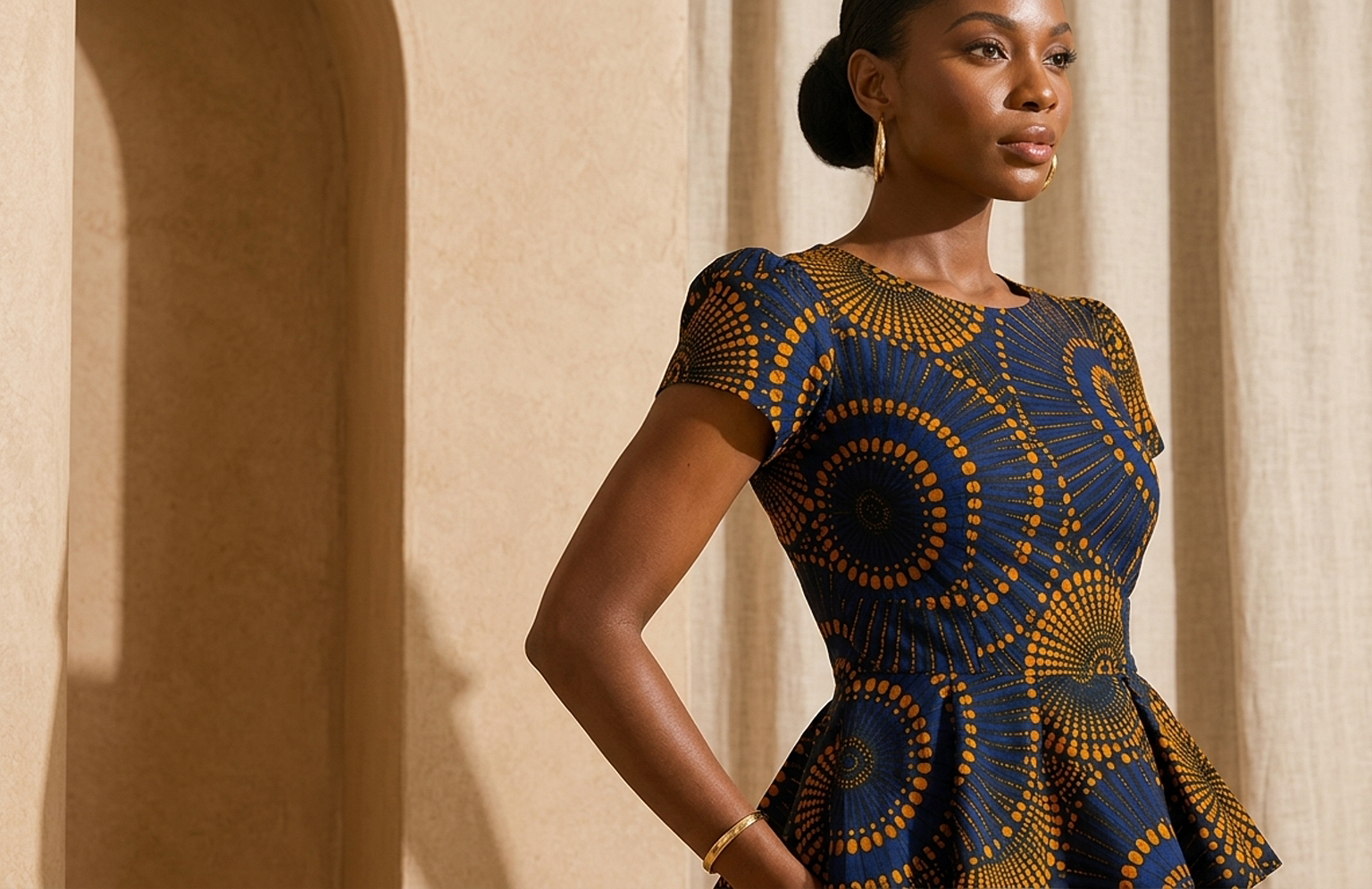 Detail editorial view of the Nia Peplum Top