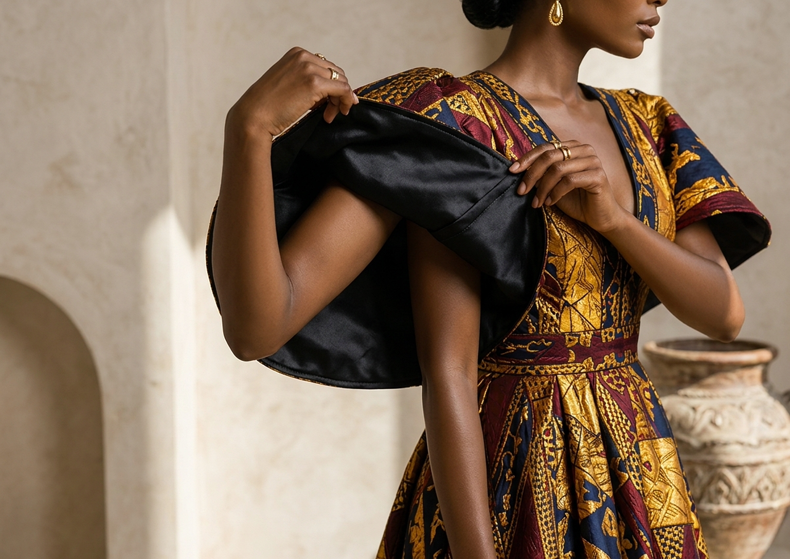 Close editorial view of the Zuri Kente Maxi Dress
